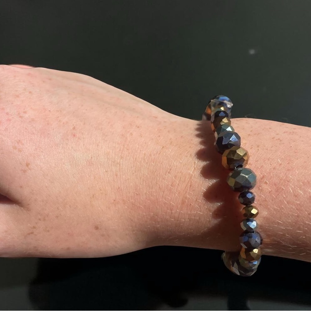 blue, teal, and gold diamond bracelet
